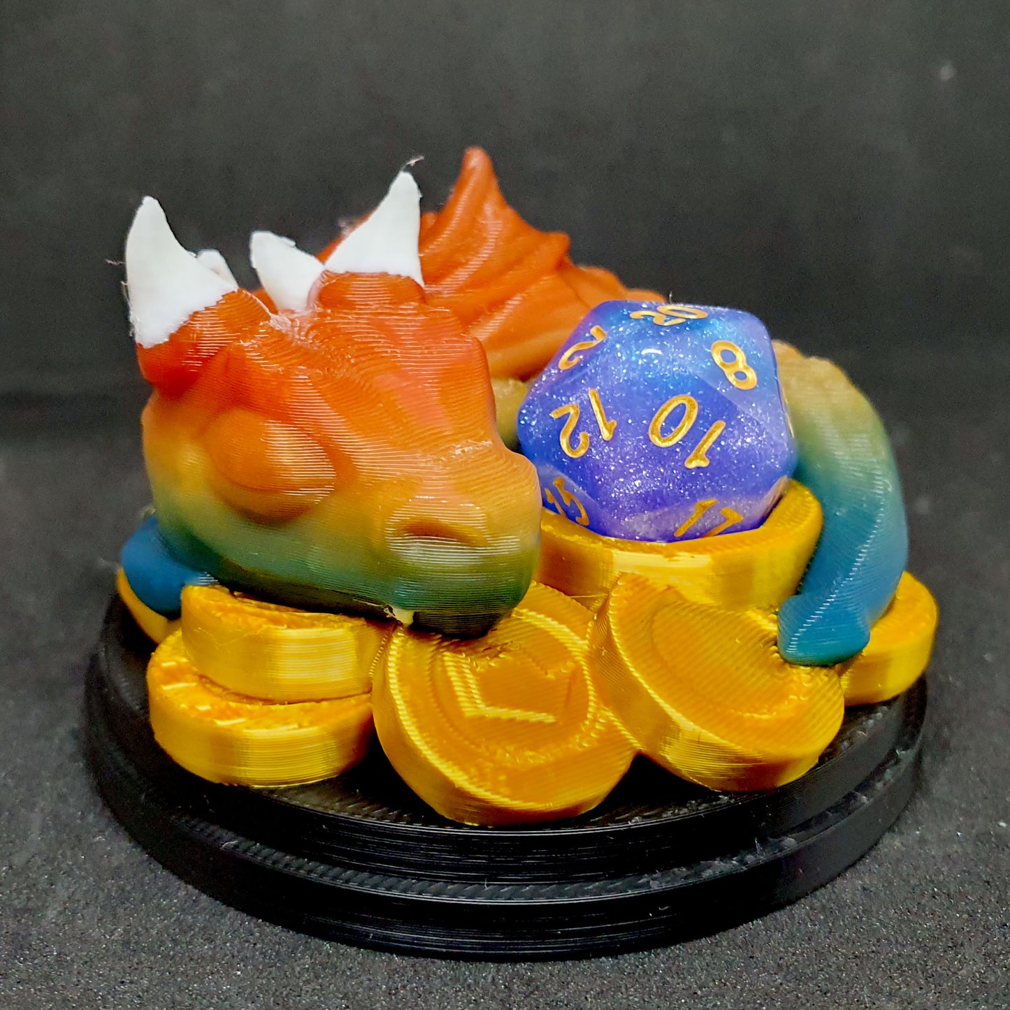 Baby Dragon On Coins Dice Guardian