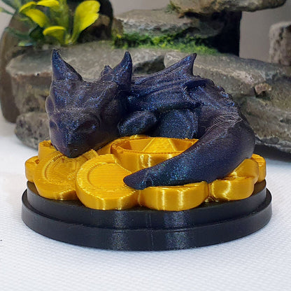 Baby Dragon On Coins Dice Guardian