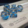 Quicksand Glow Blue - Liquid Core Resin Dice Set