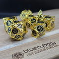 Quiver's Quest - Gold Black - Hollow - Metal Dice Set