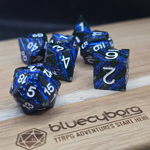 Abyssal Sapphire Shard black and blue solid metal dice set