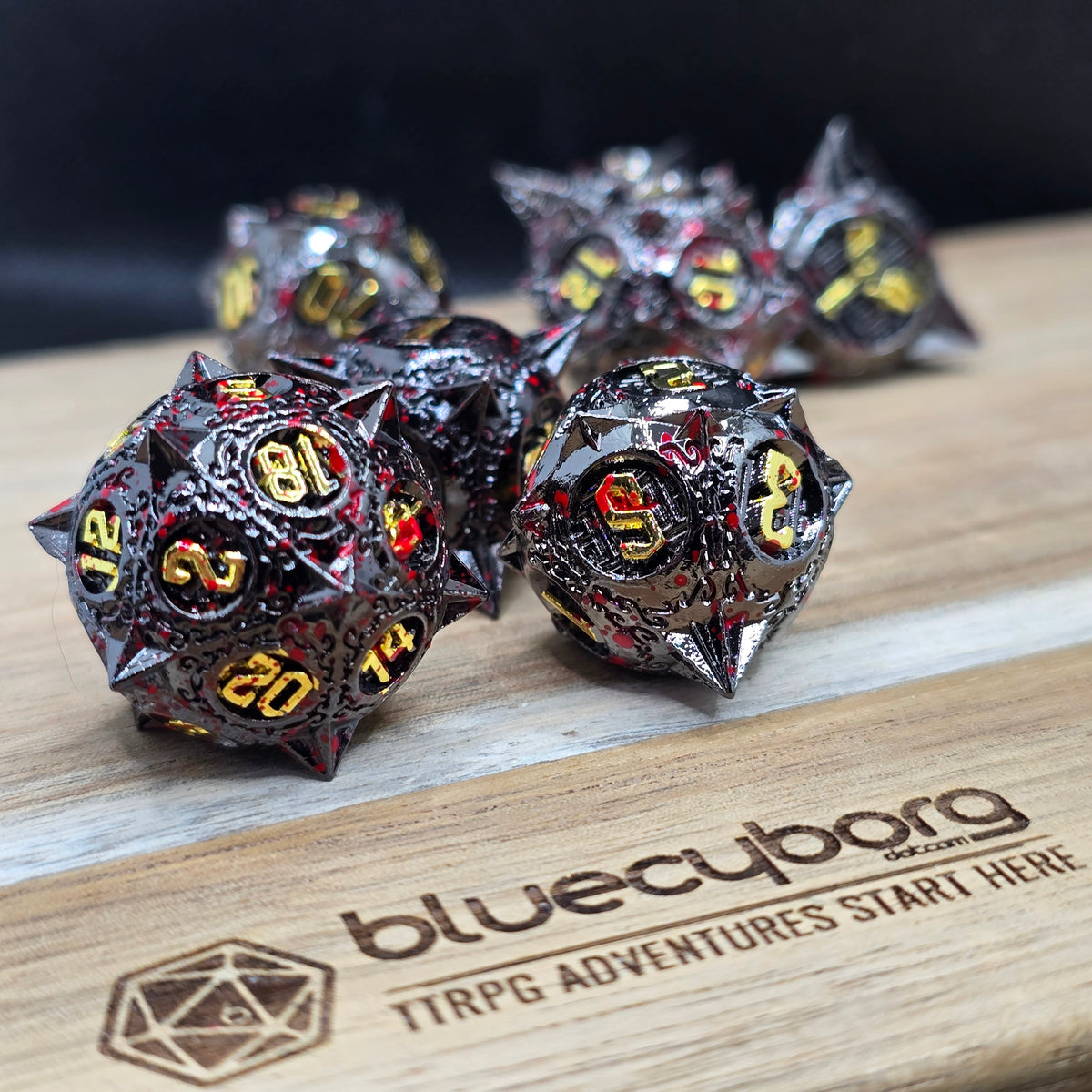 Bloodgilt Flail black red and gold spiked metal RPG dice set