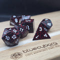 Crimson Rift black and red solid metal dice set