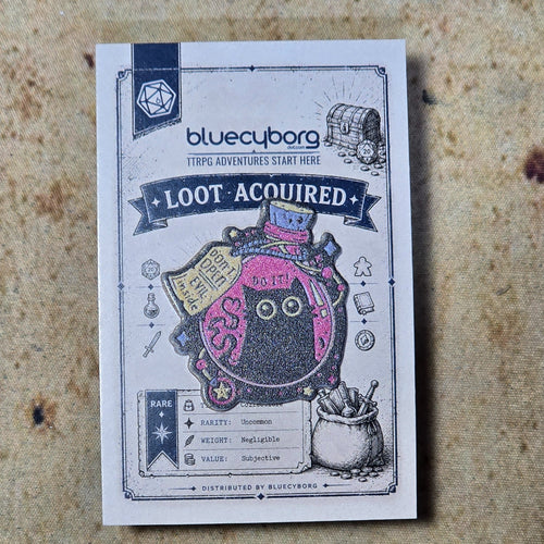 Bottle of Evil Cat Acrylic Pin Badge on BlueCyborg backing card