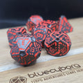 Circuit Core black and orange solid metal RPG dice set