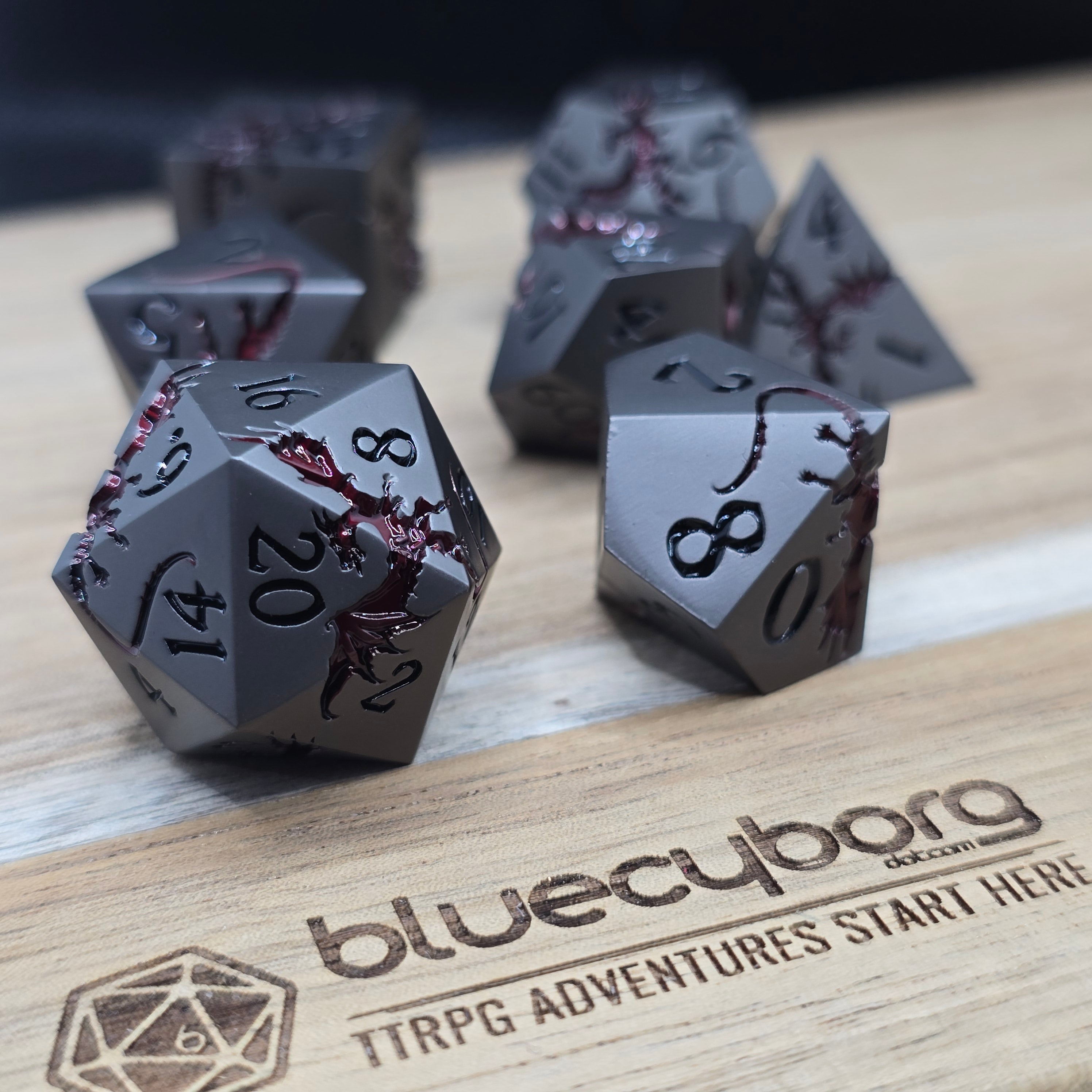 Crimson Iron Wyrm dark gunmetal metal dice set with deep red dragon detailing
