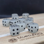 Ghostlight glow in the dark acrylic D6 dice set in normal light