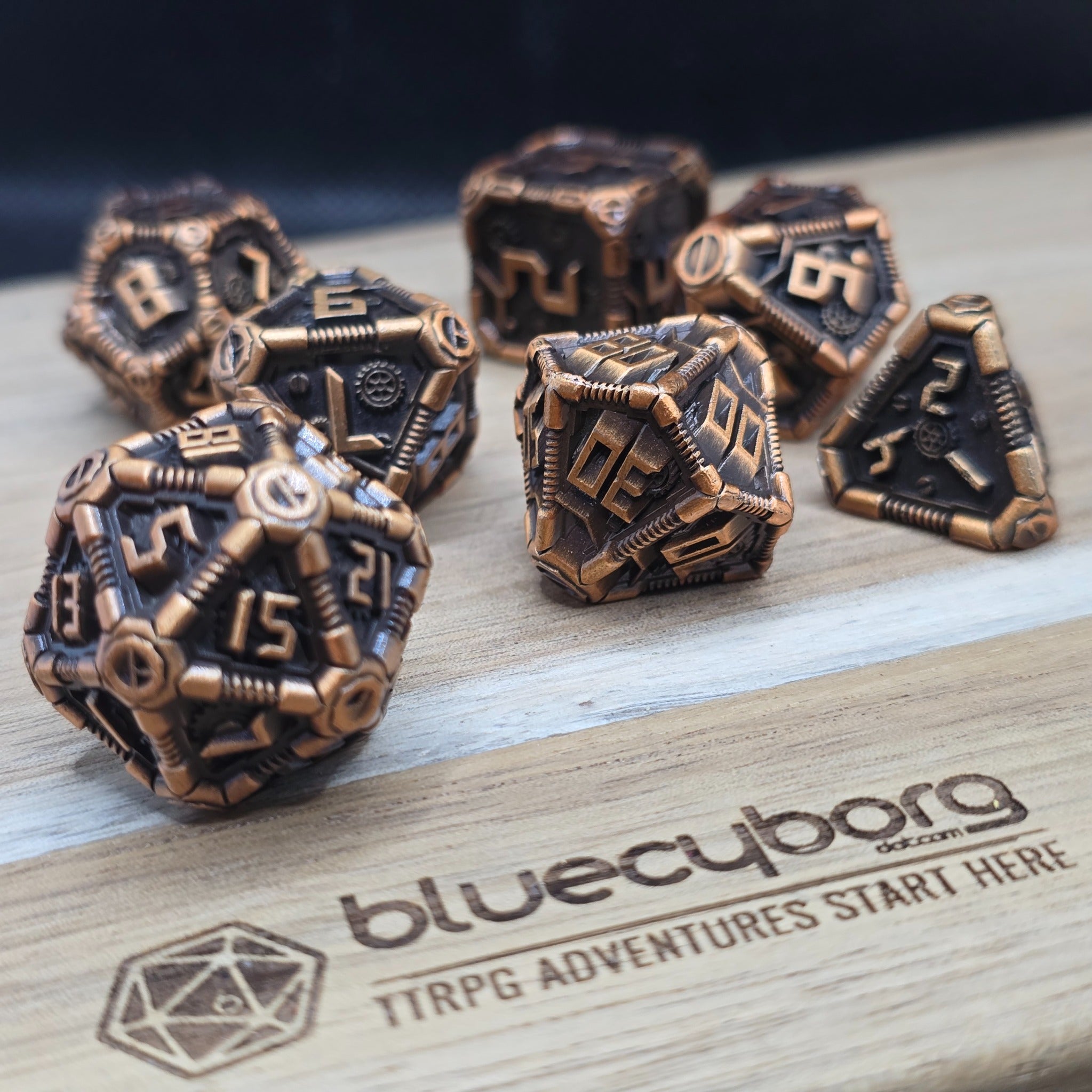 Reactor Core Sci-Fi Themed metal dice set with black and antique copper finish, industrial panel details and copper numbers