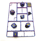 Seven assembled RPG dice displayed on the empty kit card frame