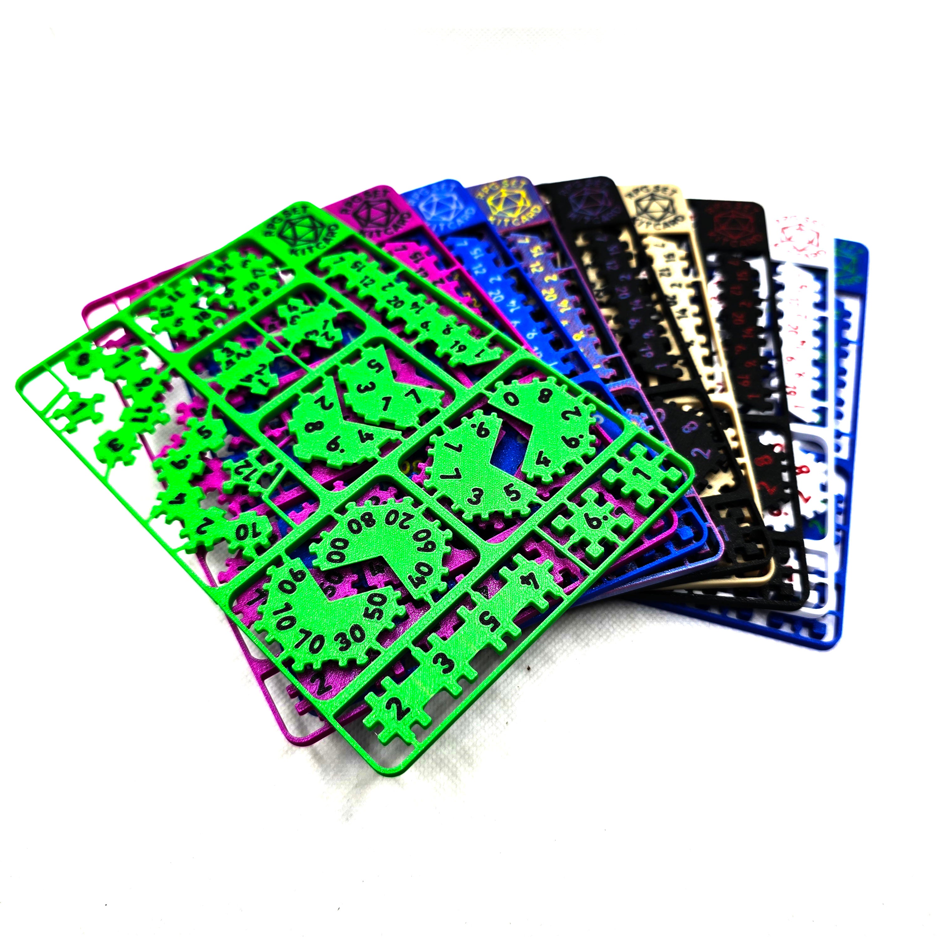 Selection of RPG dice kit cards in assorted colours