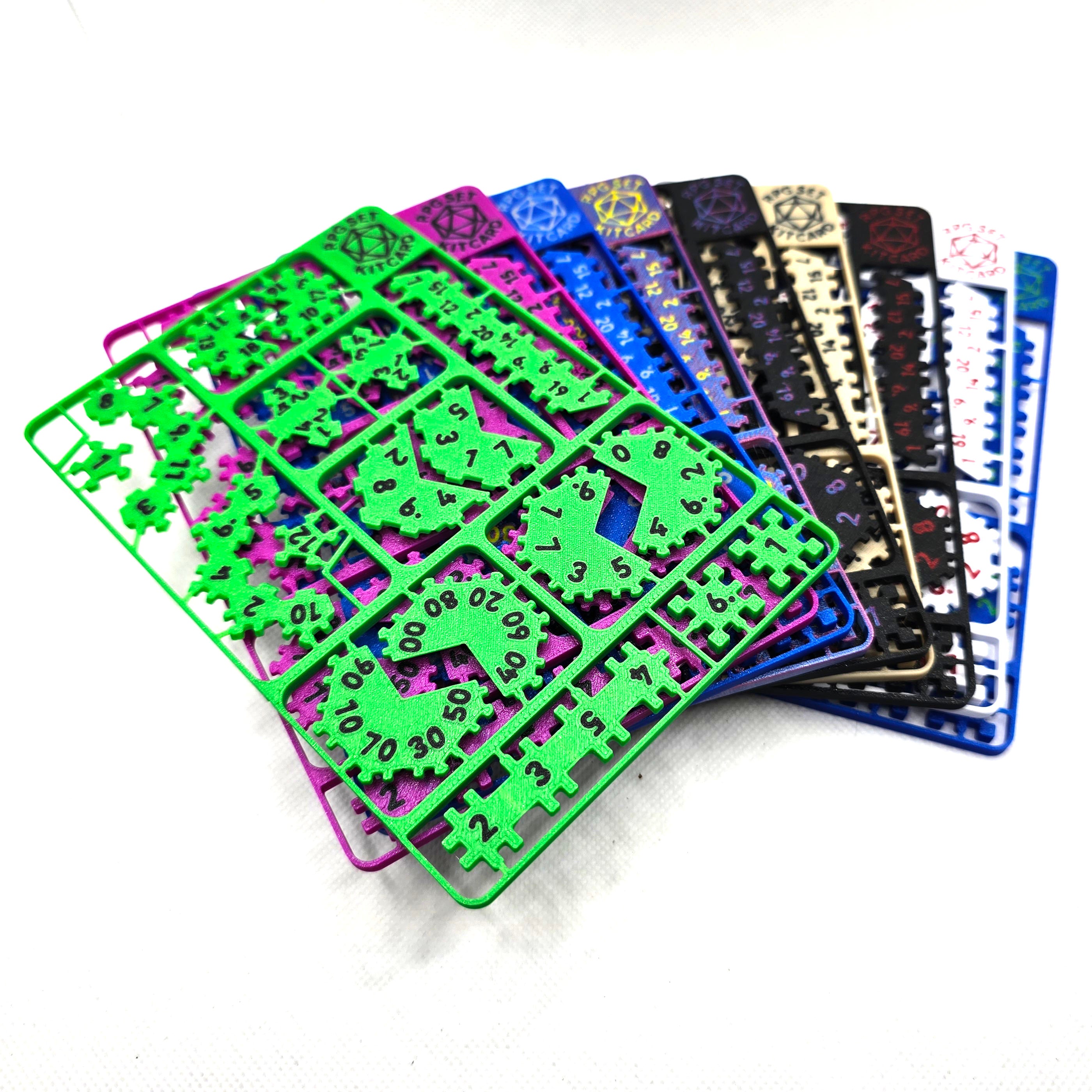 Assorted colourful RPG dice set kit cards