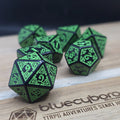 Thornwood Runebound acrylic dice set in black with bright green knotwork