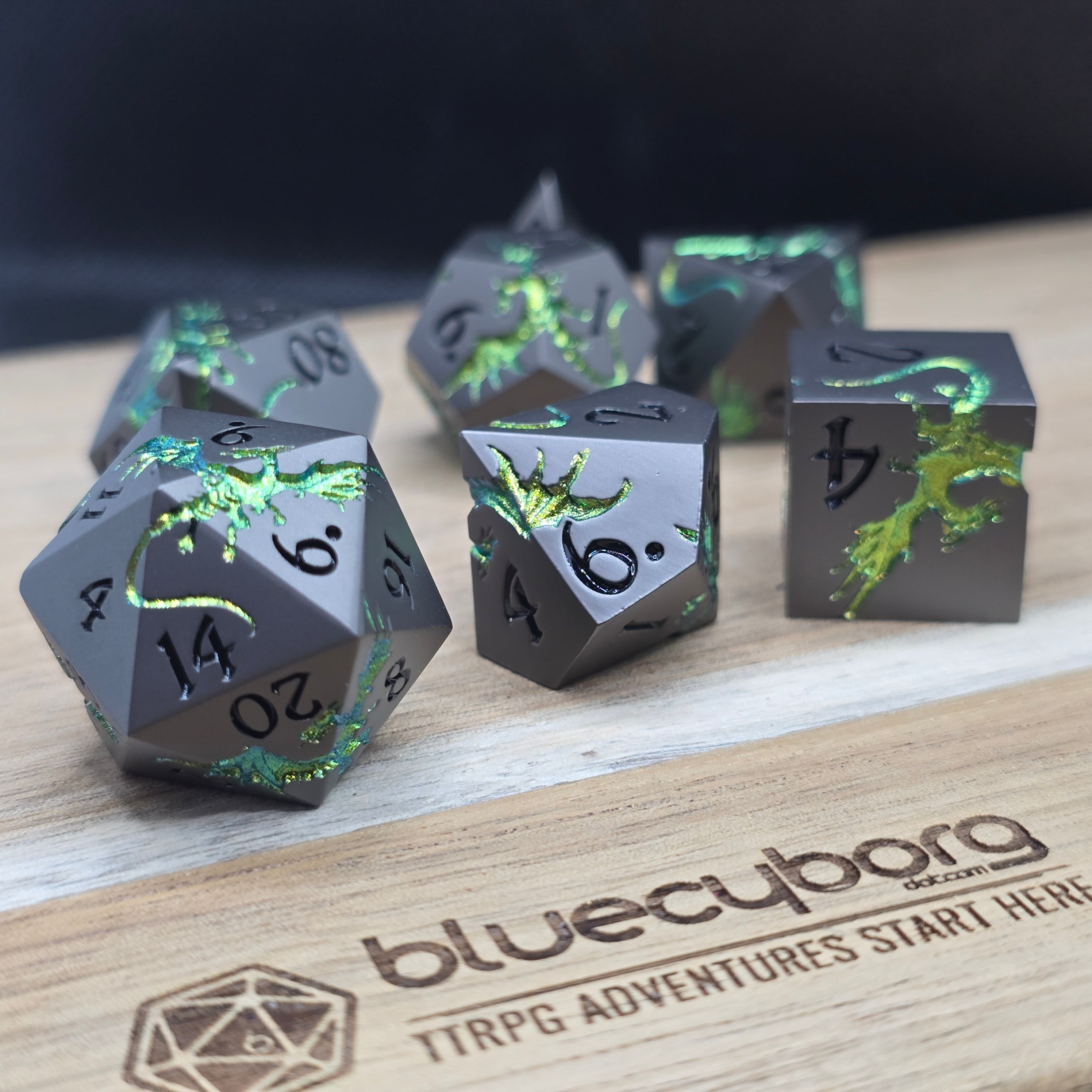 Viridian Wyrm gunmetal metal dice set with green iridescent dragon detailing