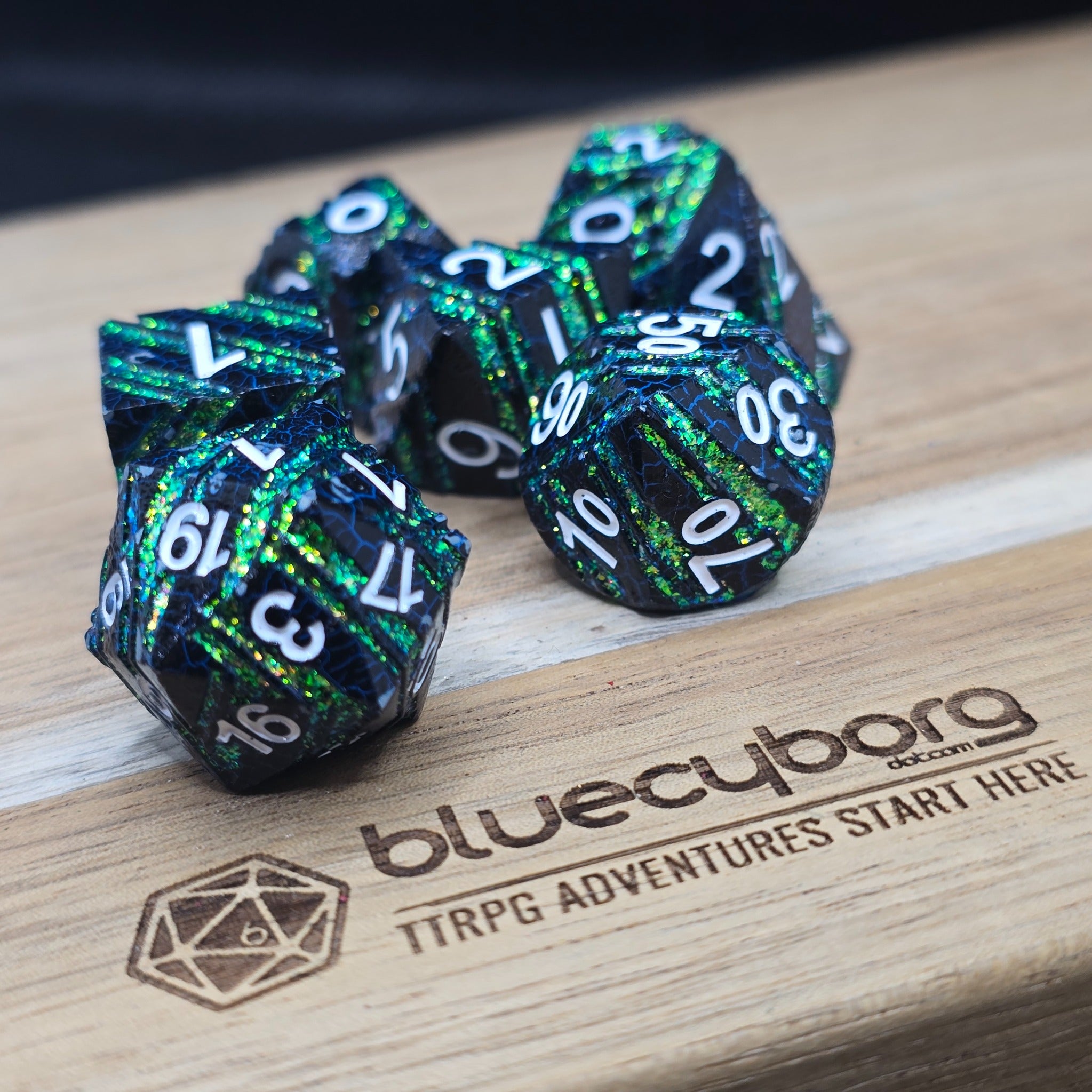 Void Emerald Shard black and green solid metal dice set