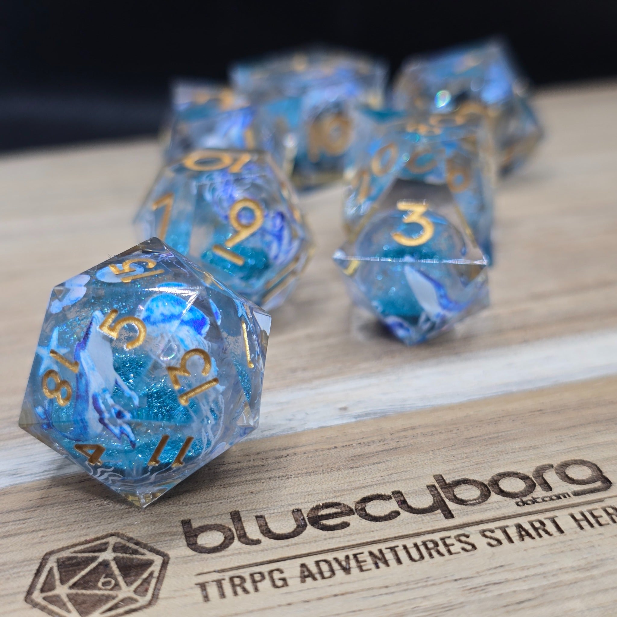 Whale Song Drift liquid core resin dice set with whales and jellyfish