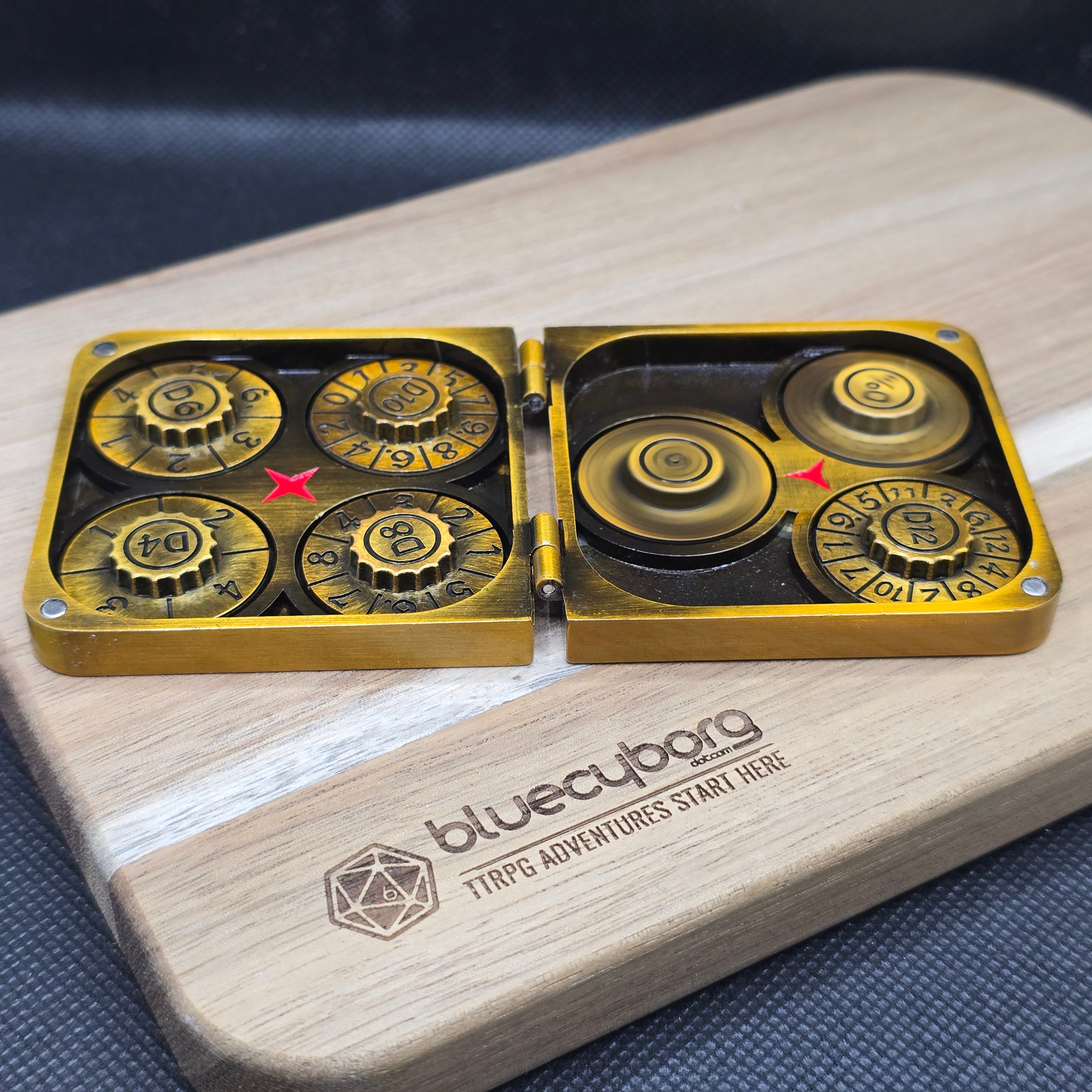 Wyrmhold Dial antique gold metal dice spinner with D20 and percentile dials spinning