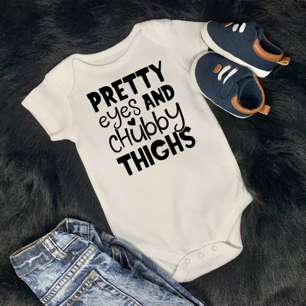 Pretty Eyes and Chubby Thighs Babygrow